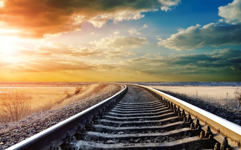 Railroad Tracks at Sunset — Blue, Dramatic, Photograph, Sky