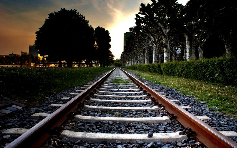 Railroad Tracks at Sunset — Brown, Serene