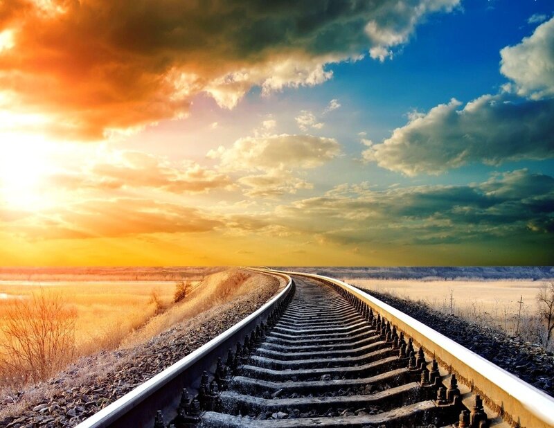Railroad Tracks at Sunset — Orange, Dramatic
