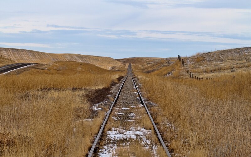 Railroad tracks in a prairie landscape