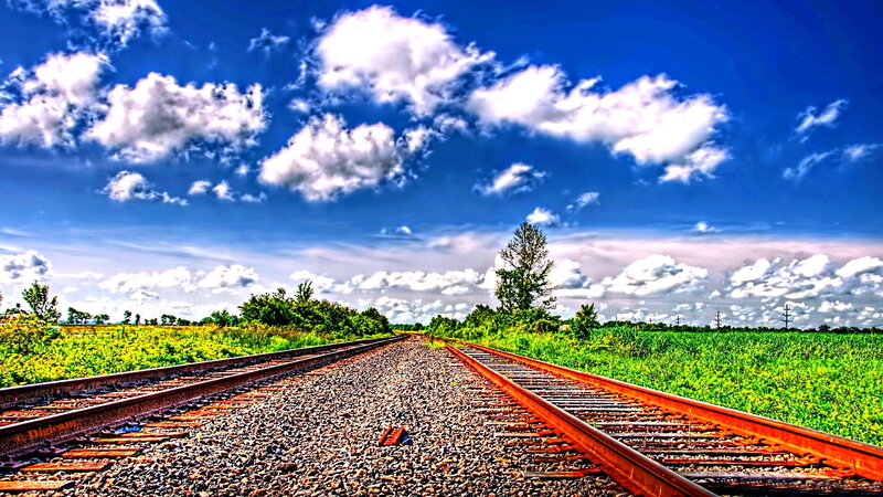 Railroad Tracks in Field — Blue, Dramatic, Afternoon