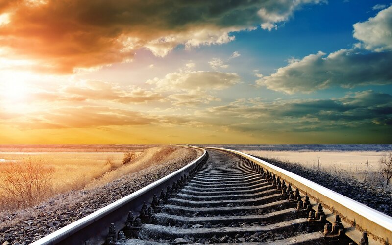 Railroad Tracks in Field — Blue, Dramatic, Sunset, Photograph