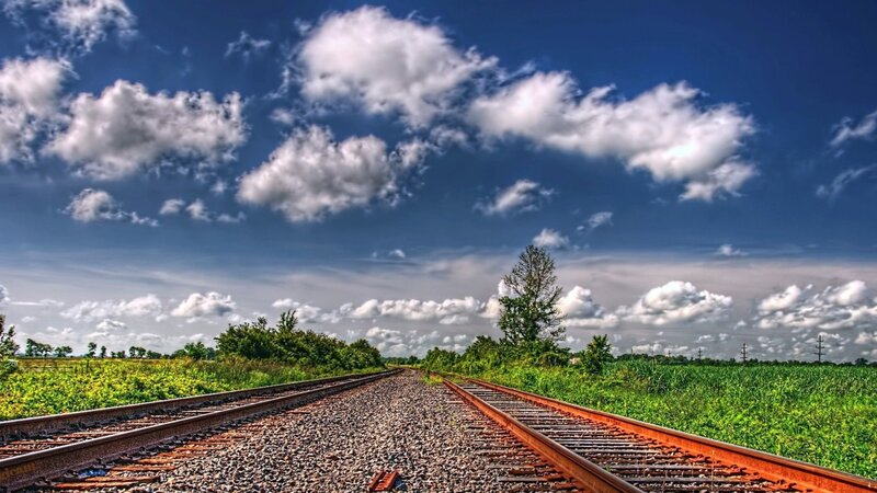 Railroad Tracks in Field — Blue, Serene, Afternoon, Photograph