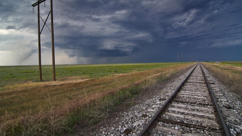 Railroad Tracks in Field — Gray, Dramatic
