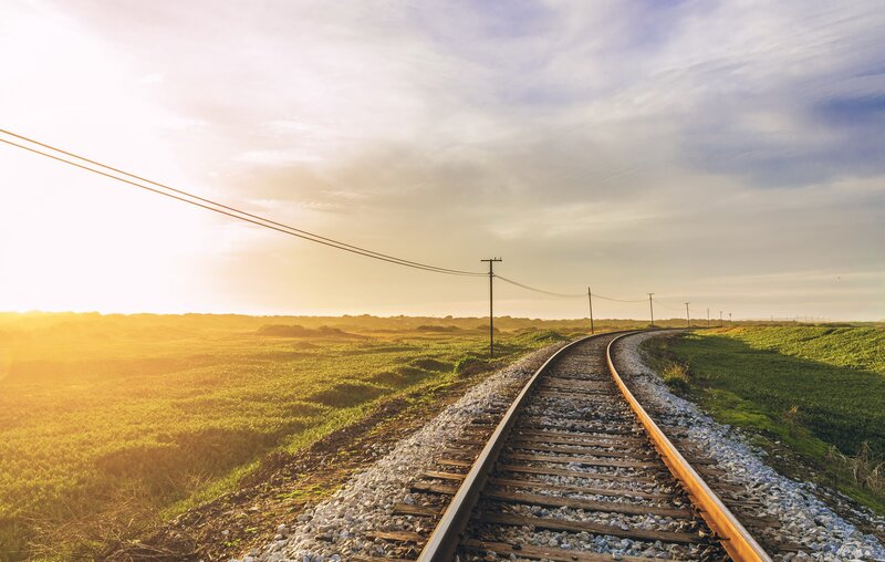 Railroad Tracks in Field — Green, Serene