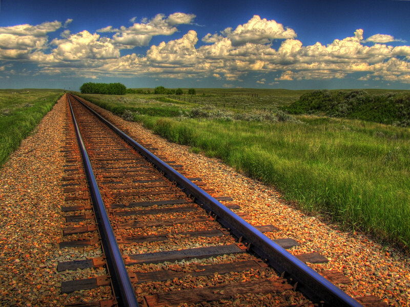 Railroad Tracks in Field — Green