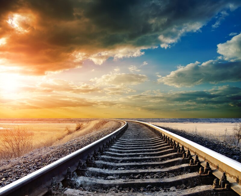 Railroad Tracks in Field — Orange