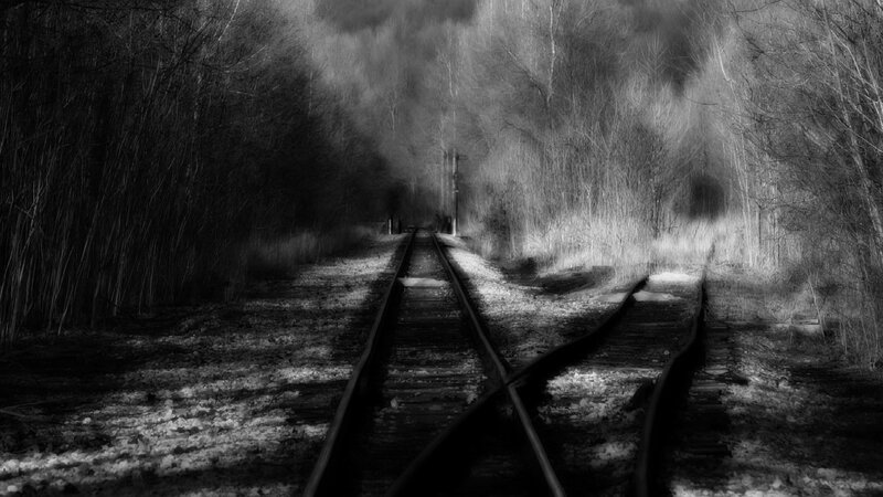 Railroad Tracks in Forest — Black, Somber