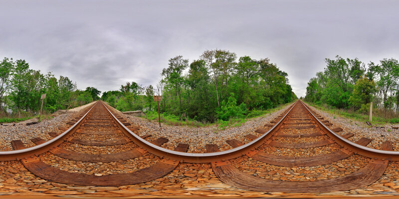 Railroad Tracks in Forest — Green, Overcast