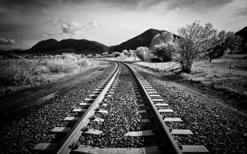 Railroad tracks in mountain landscape