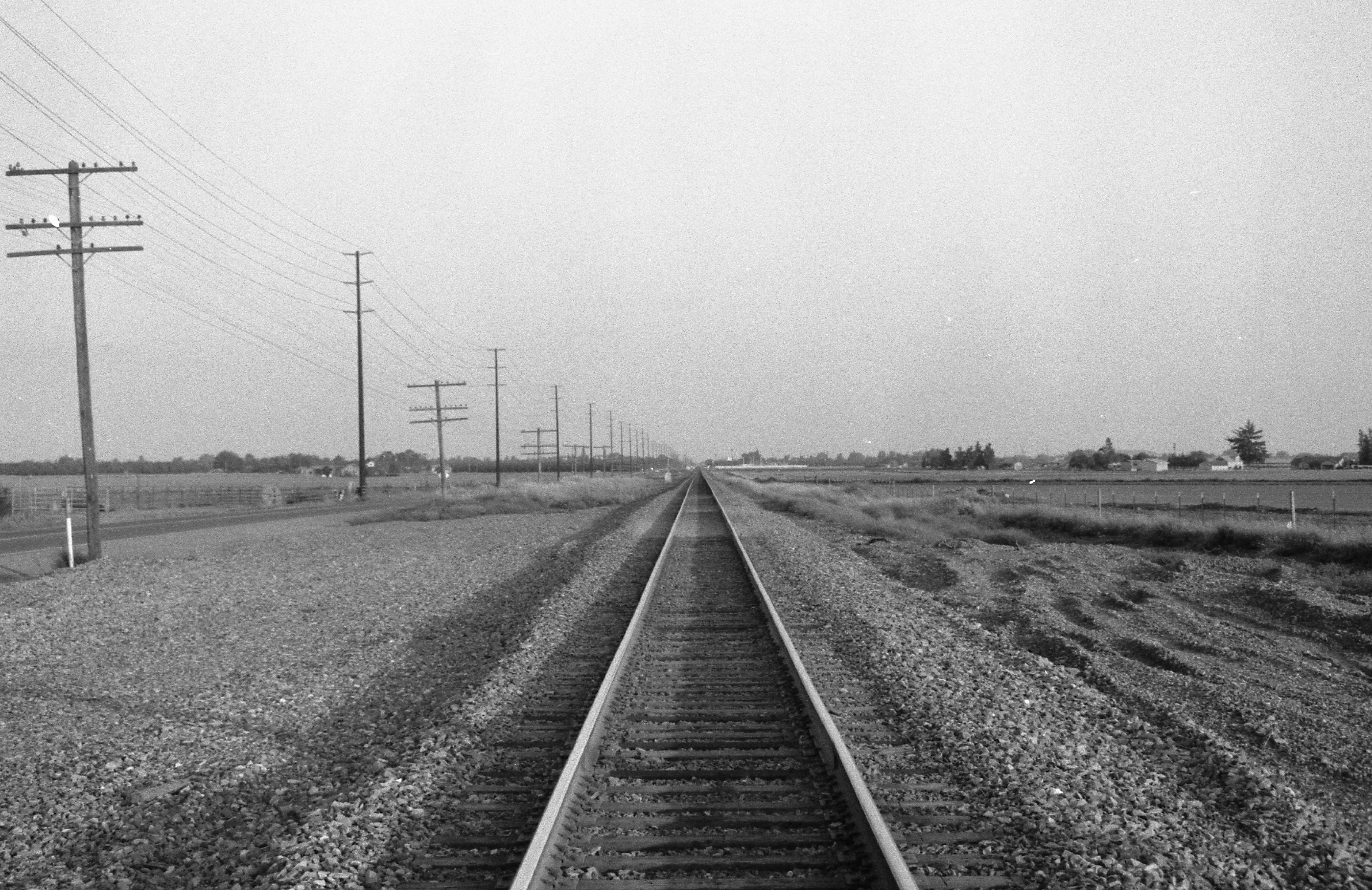 Railroad tracks in rural landscape
