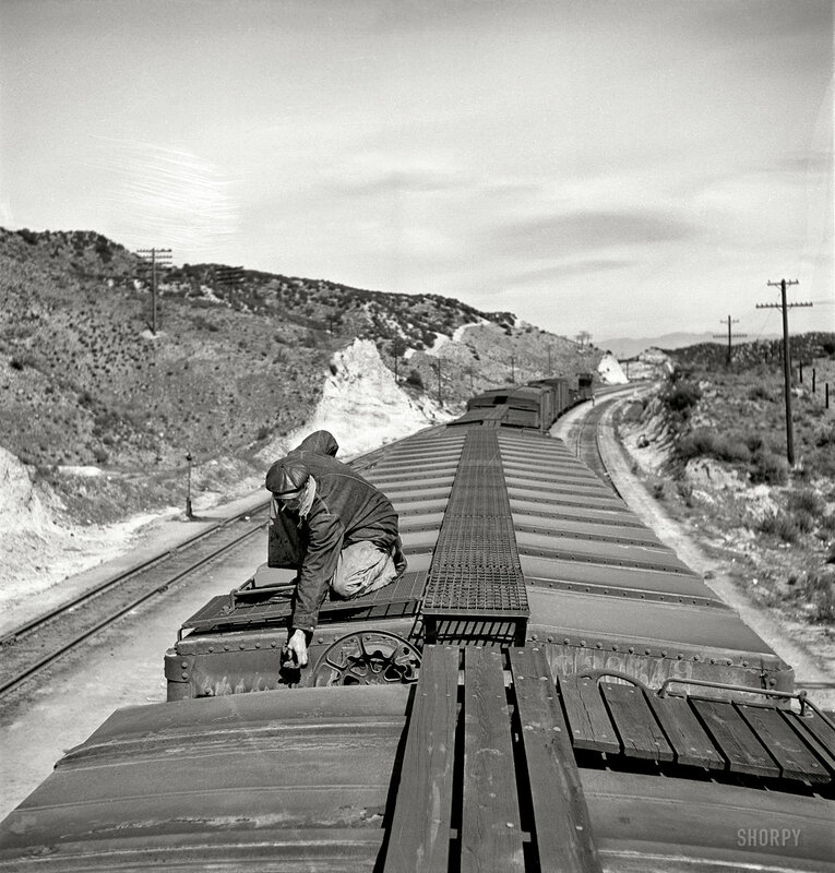 Railroad worker on freight car