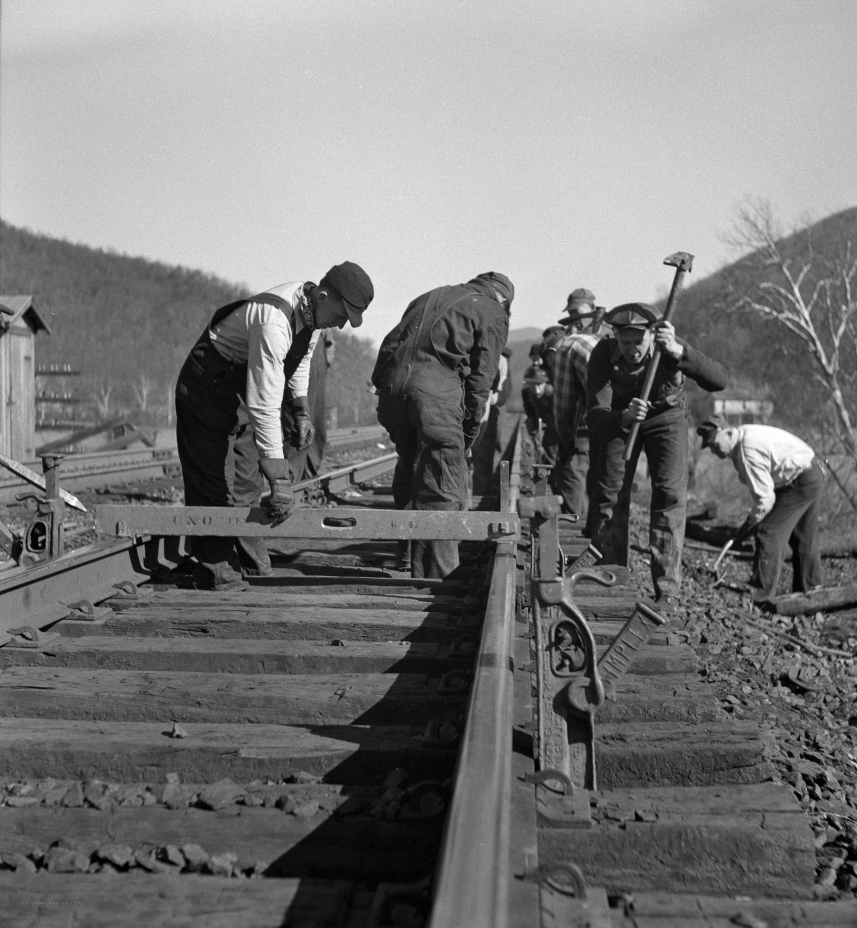 Railroad workers repairing tracks
