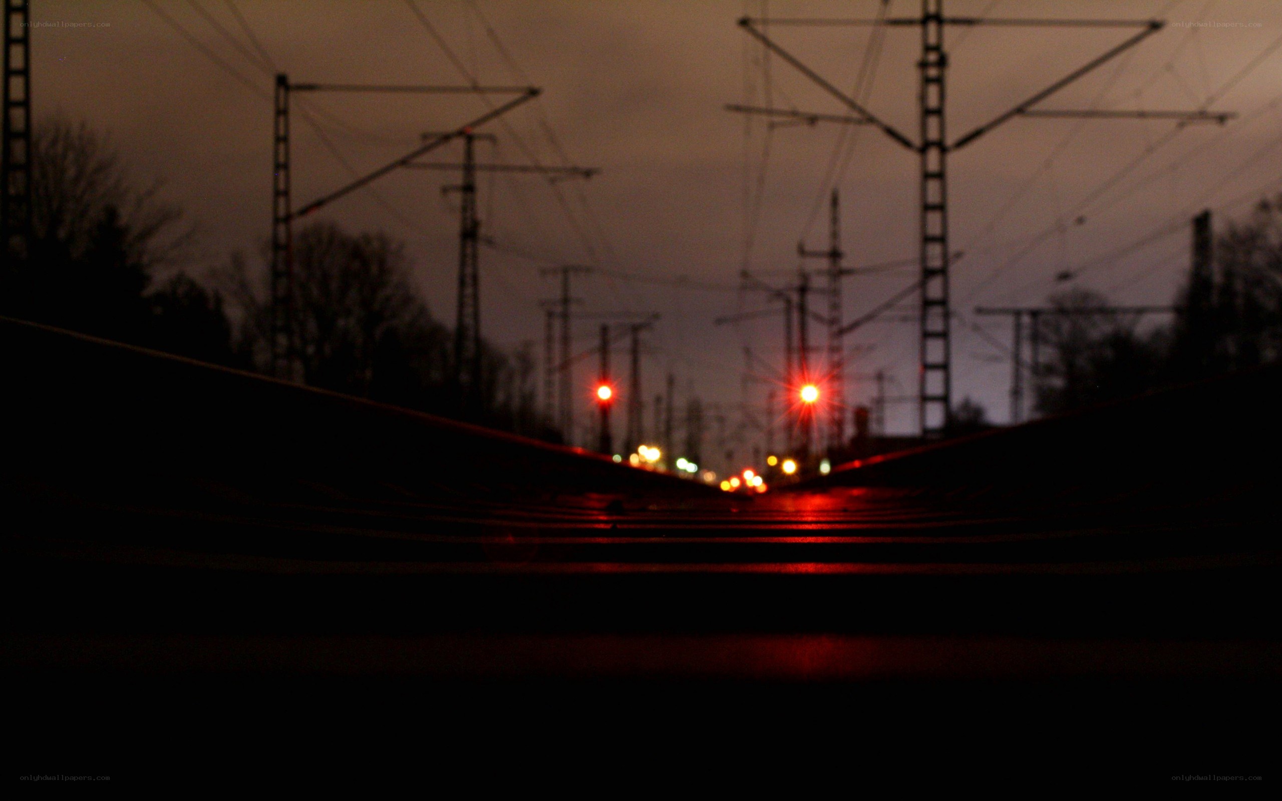 railway at dusk with red lights