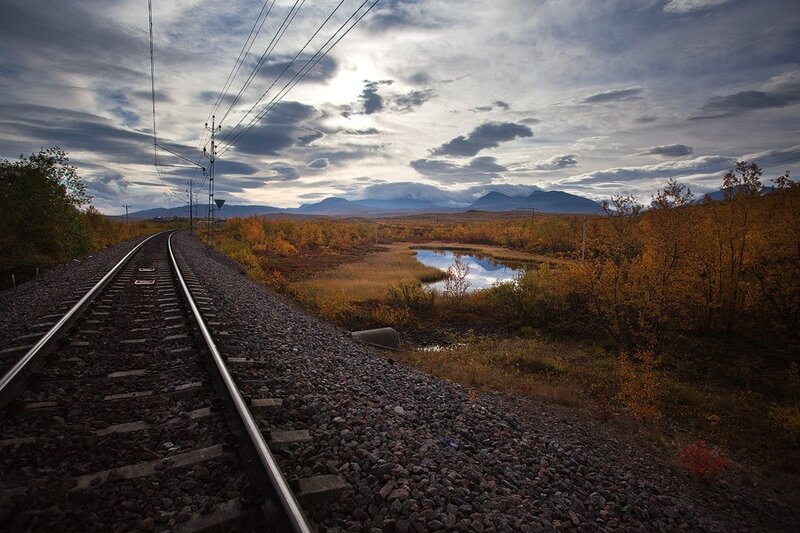 Railway through autumn landscape