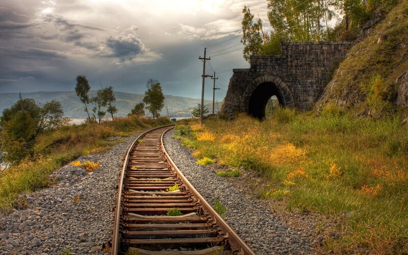 Railway track leading to tunnel