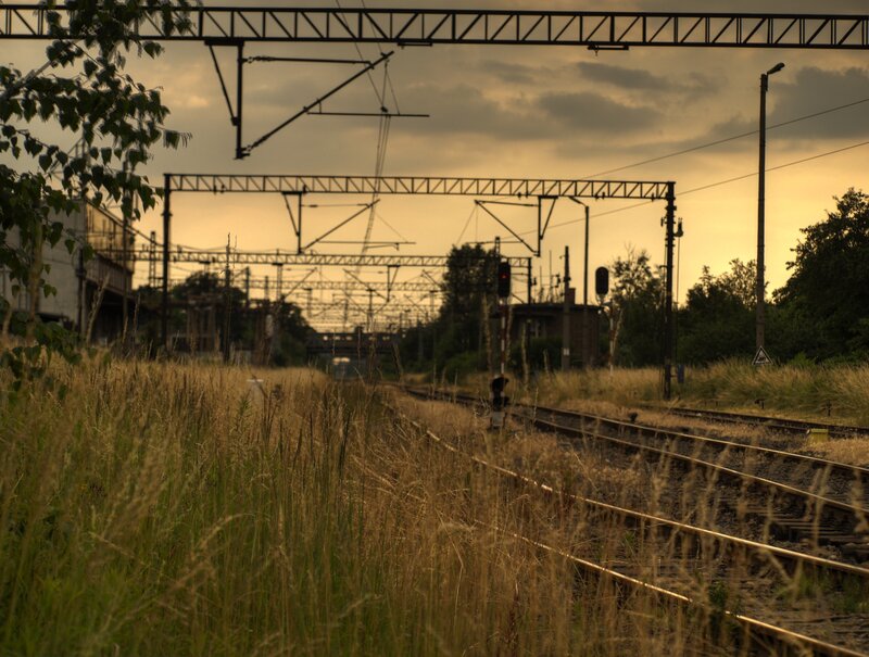 Railway Tracks at Sunset — Yellow, Serene, Photograph