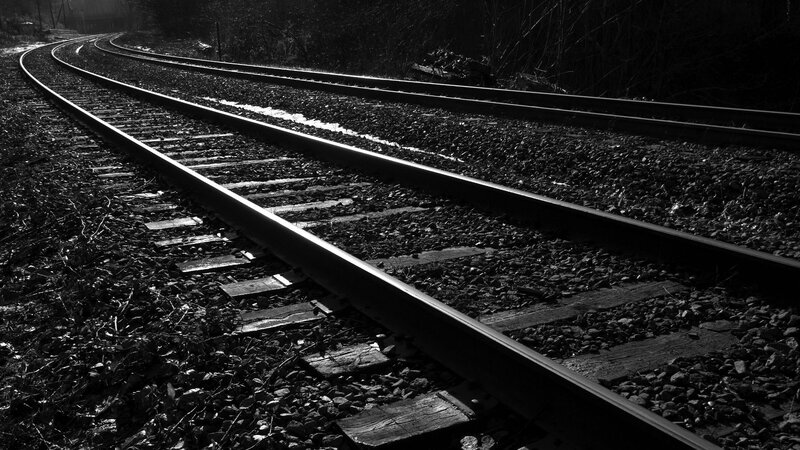 railway tracks in black and white