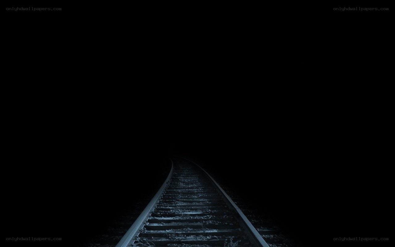 railway tracks in darkness