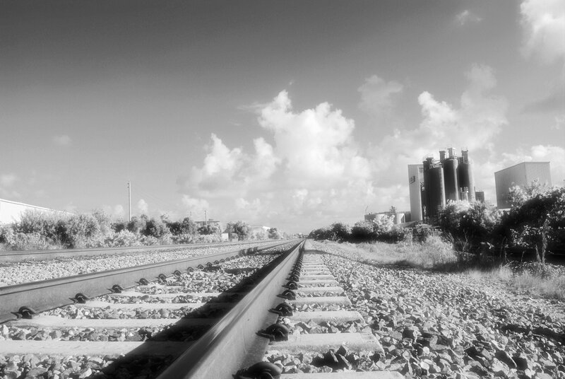Railway tracks leading to factory