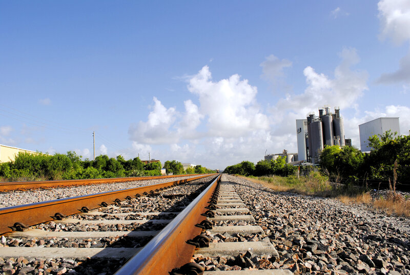 Railway tracks leading to industrial plant