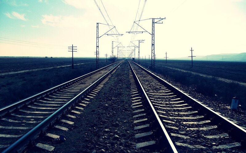 Railway tracks stretch into the distance