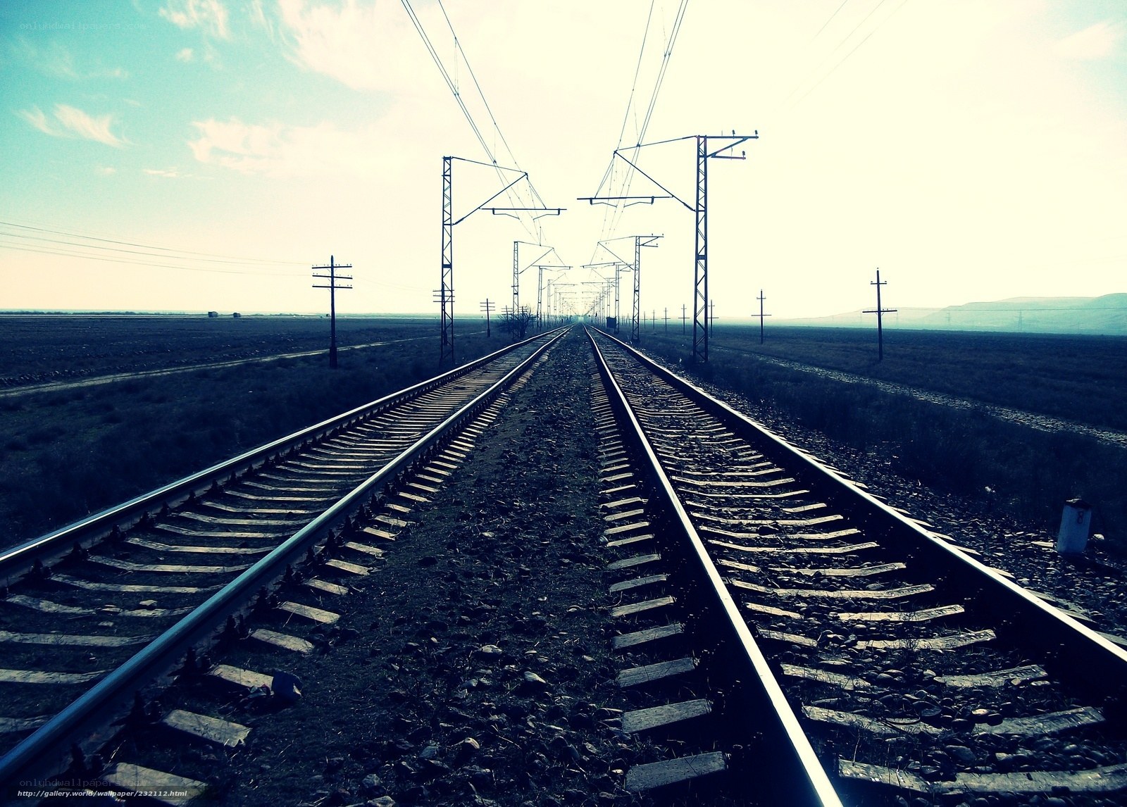 Railway tracks stretch into the distance