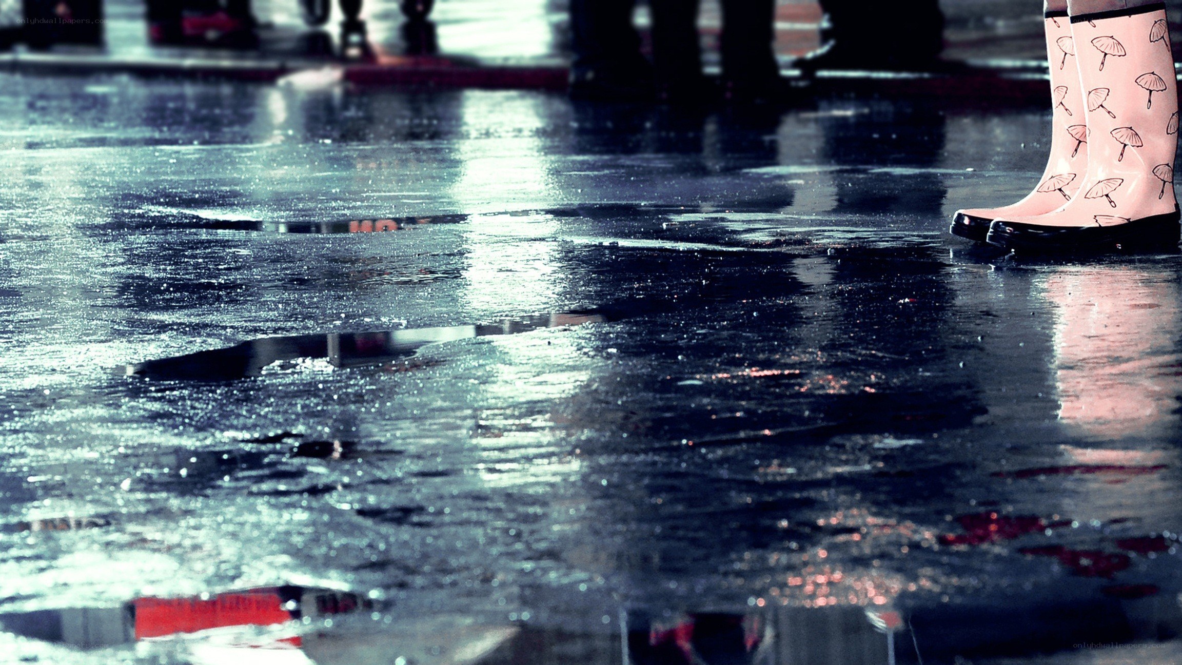 rain boots on wet pavement