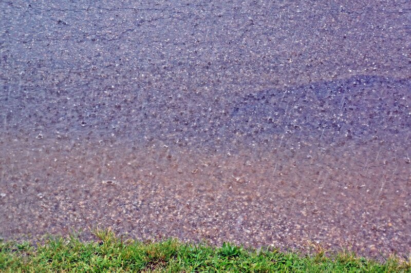 Rain on Asphalt Surface