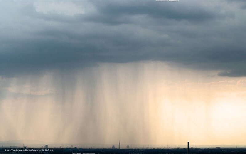Rain over city skyline