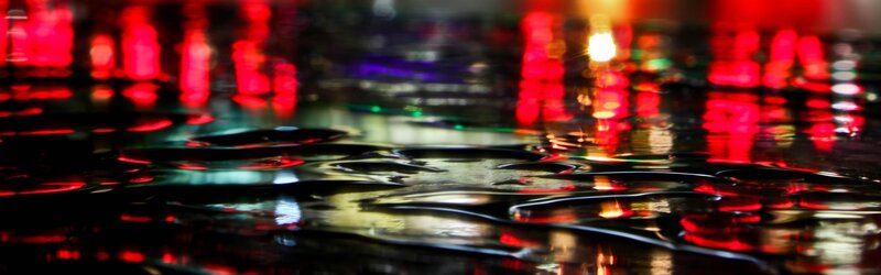 Rain Puddles Reflecting Lights