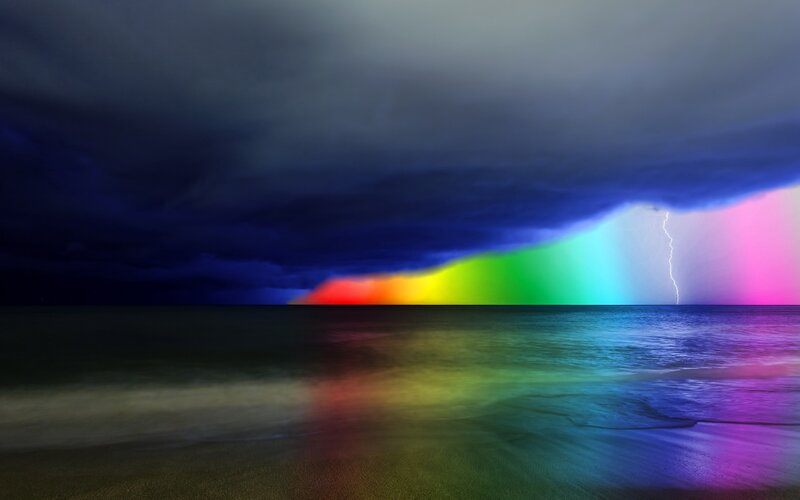 Rainbow after storm at sea