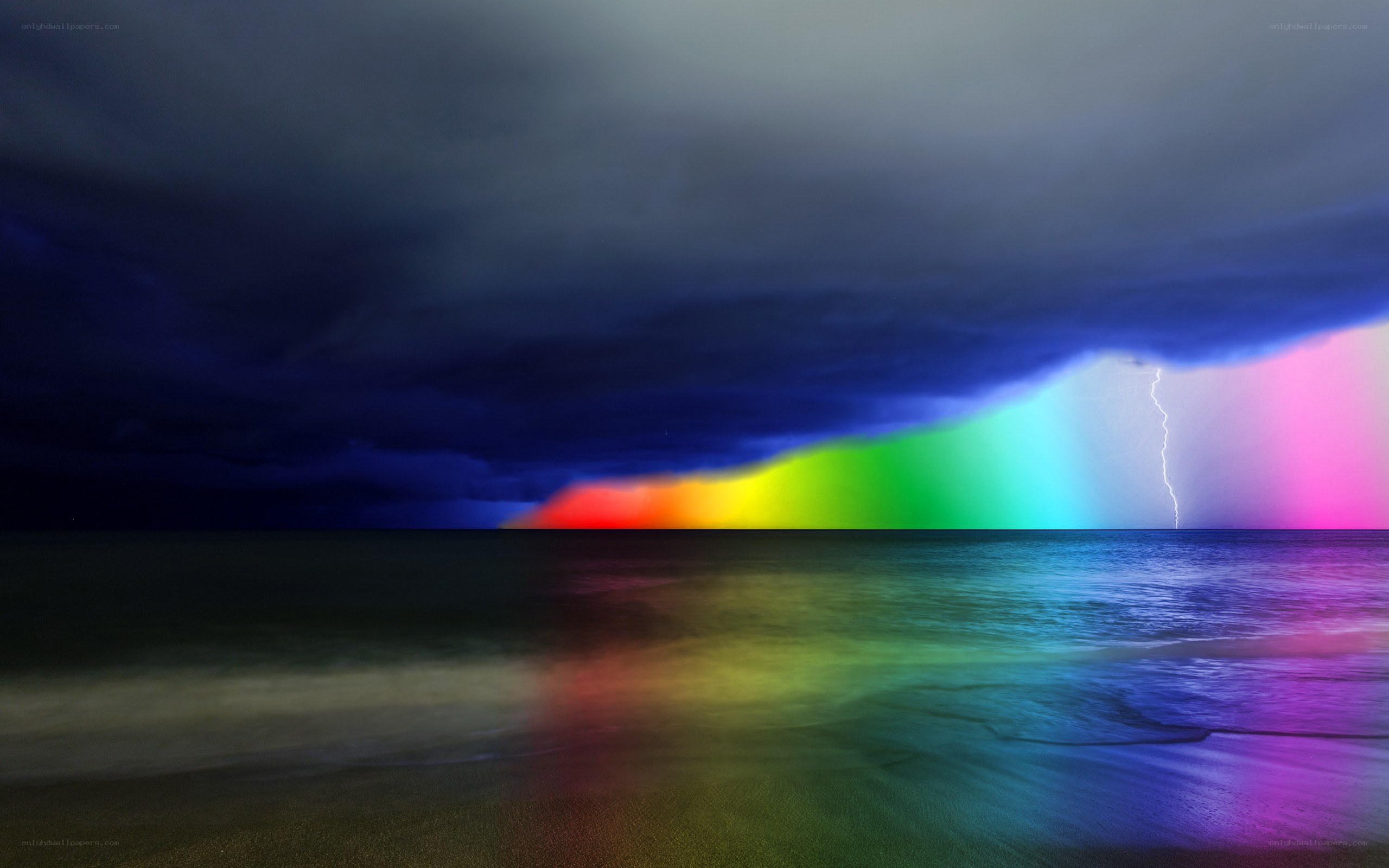 Rainbow after storm at sea