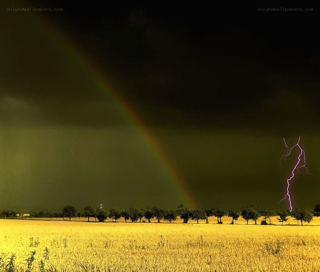 Rainbow and lightning storm