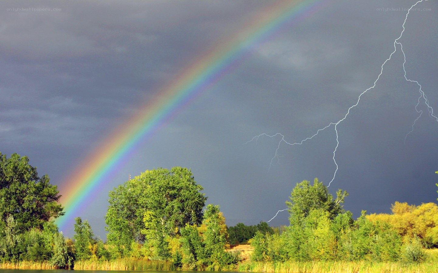 Rainbow and lightning storm