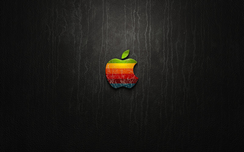 Rainbow Apple logo on black leather