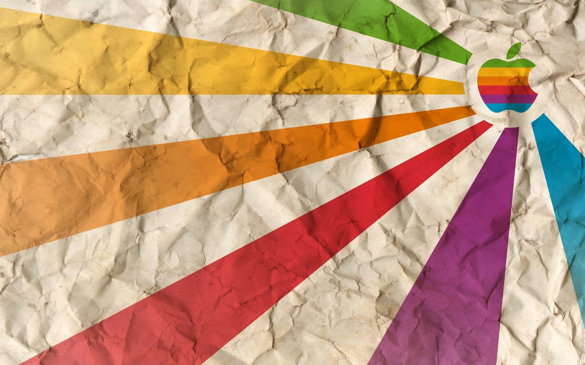 Rainbow Apple logo on crumpled paper