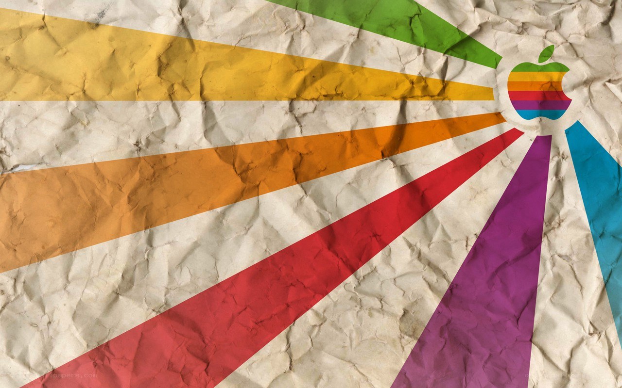 Rainbow Apple logo on crumpled paper