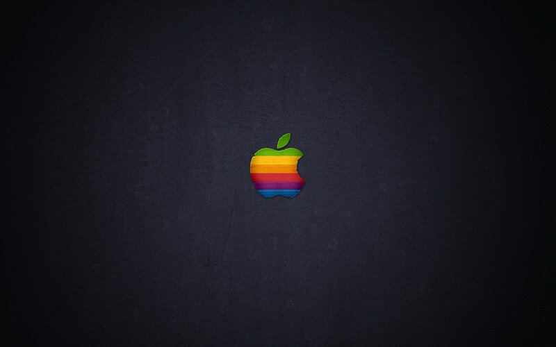Rainbow Apple logo on dark background