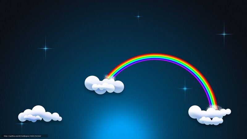Rainbow between clouds