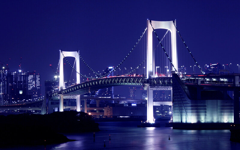 Rainbow Bridge at Night — Blue, Dramatic, Photograph, City Skyline