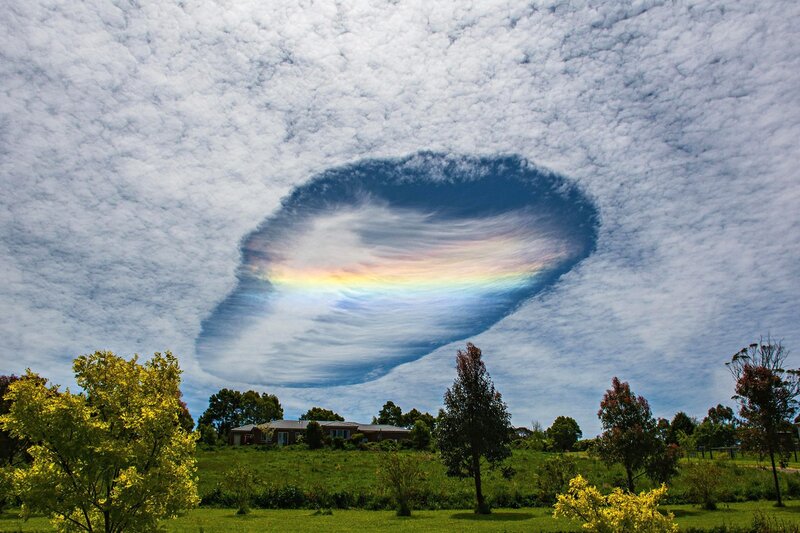 Rainbow Cloud over House