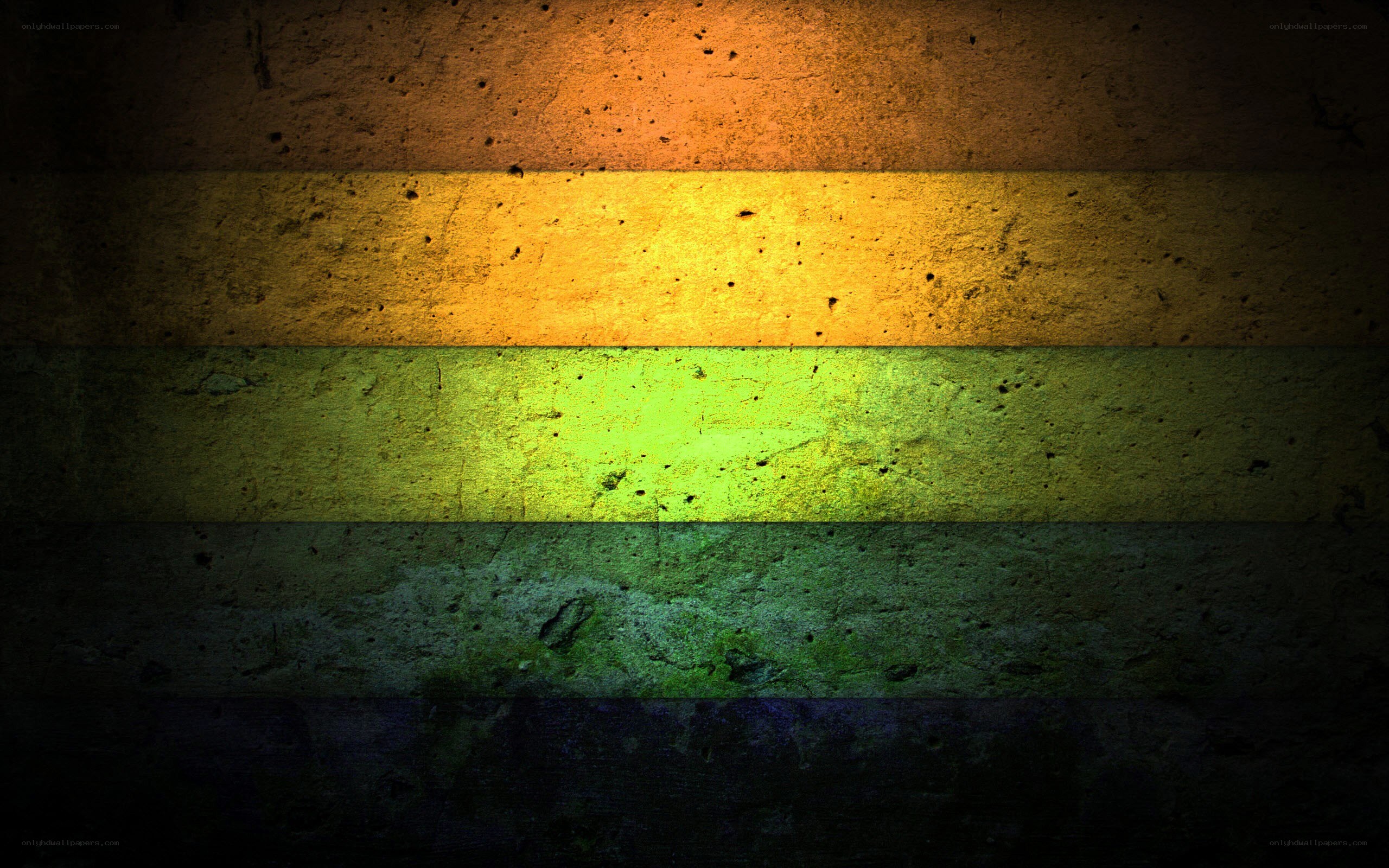rainbow flag on concrete wall