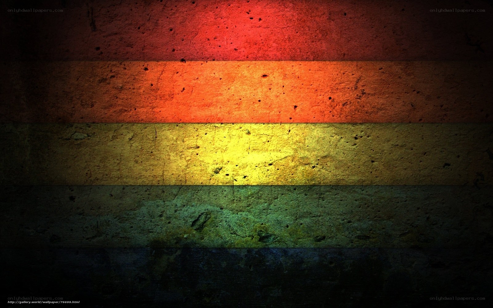 rainbow flag on concrete wall