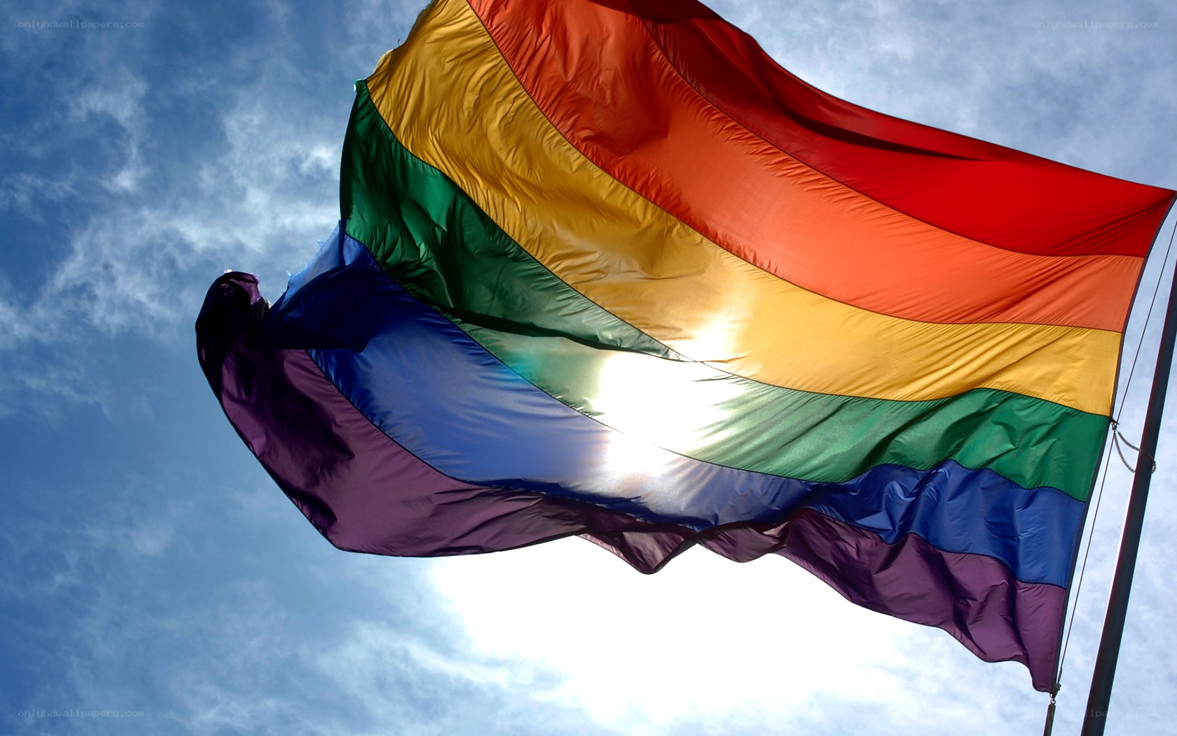 Rainbow flag waving in the sky