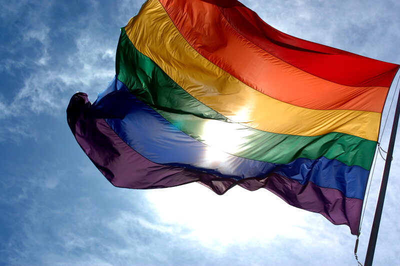 Rainbow Flag Waving — Red, Dramatic