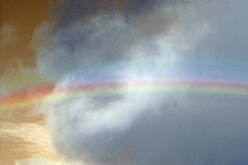 Rainbow in Cloudy Sky — Gray, Dramatic