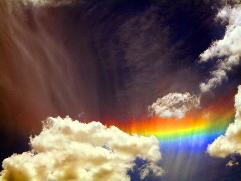 Rainbow in Cloudy Sky — White