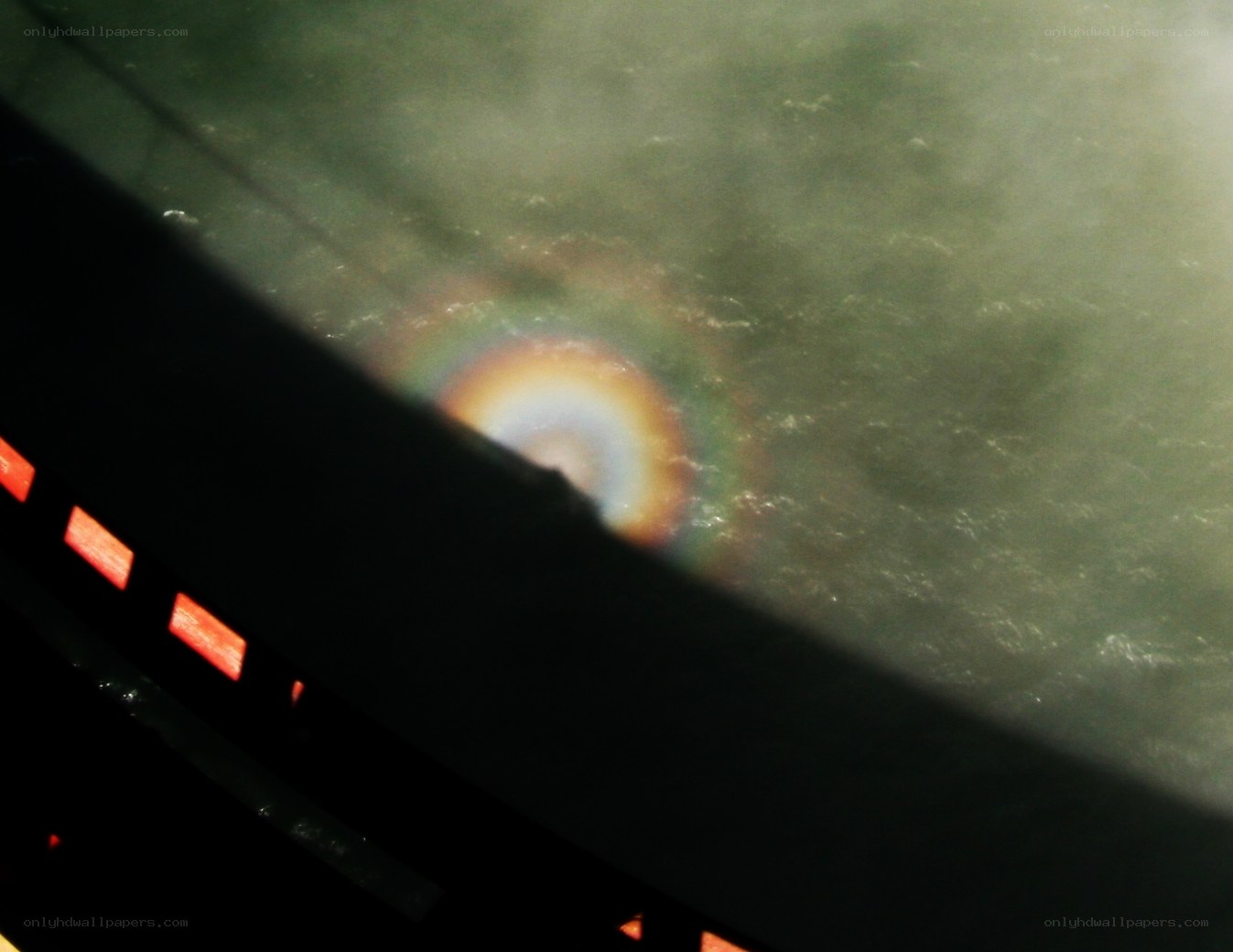 rainbow in misty water