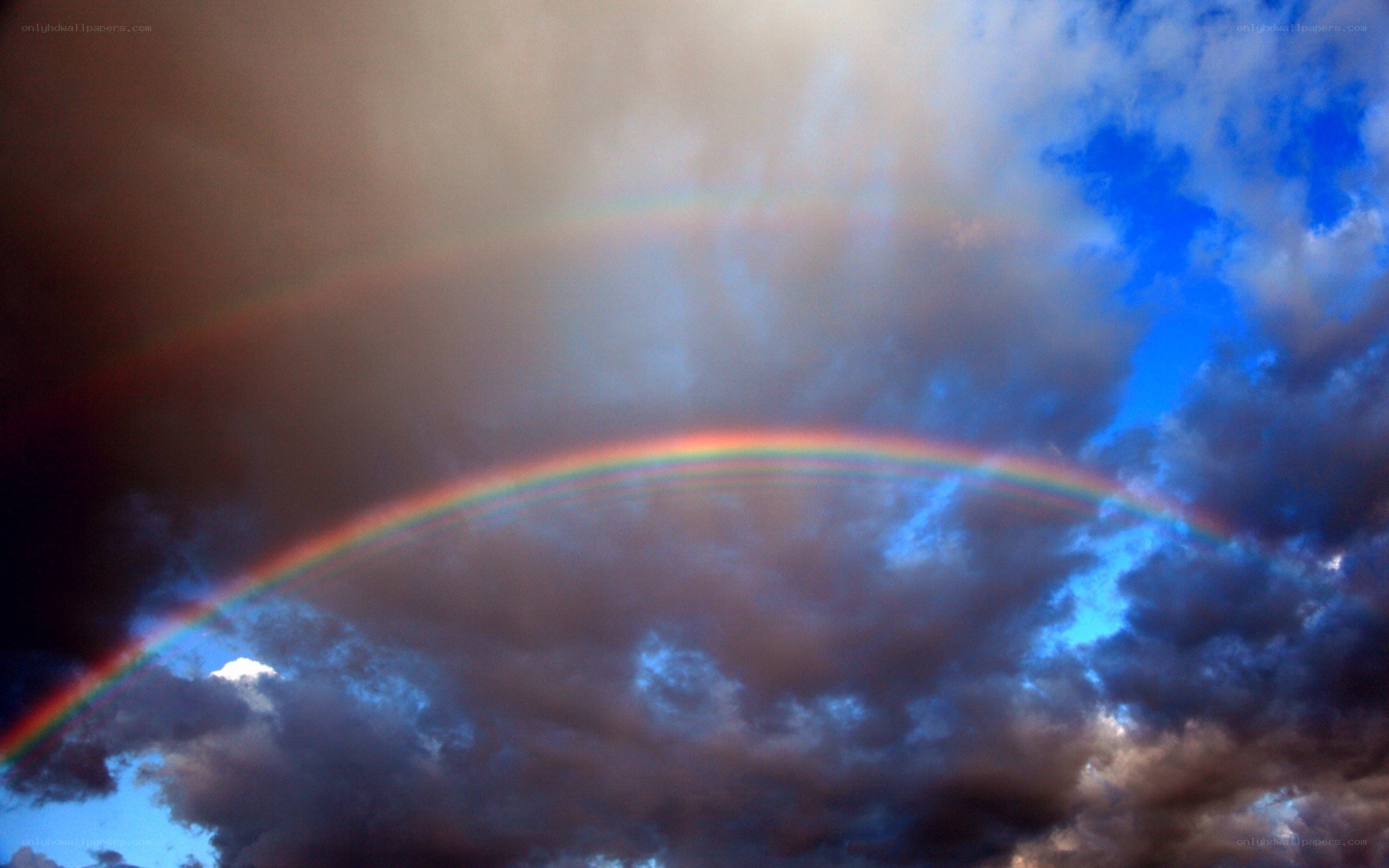 Rainbow in stormy sky